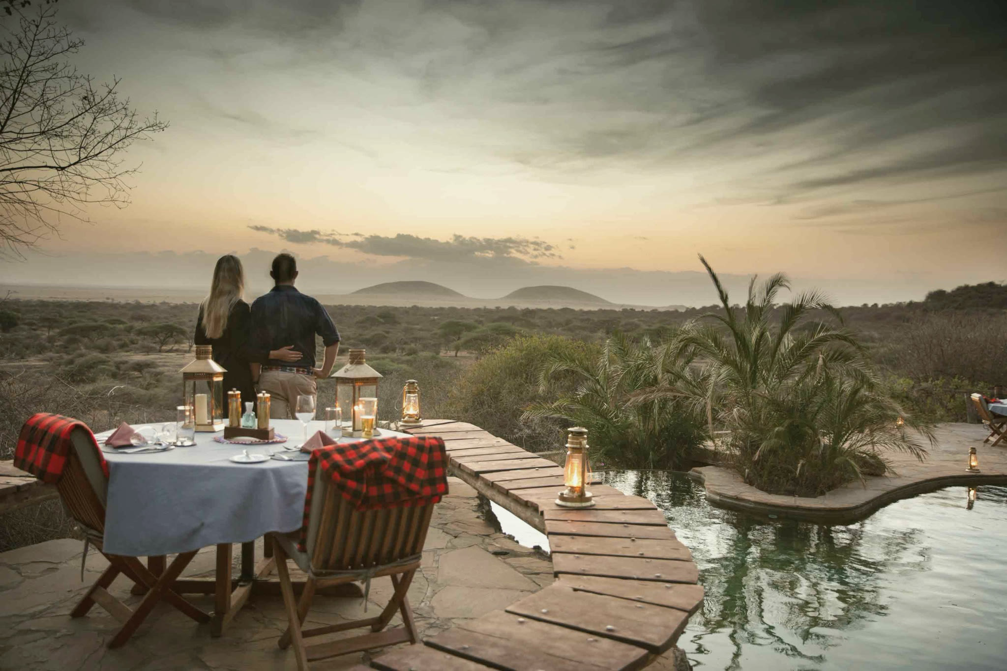 Dinner on the deck at ol Donyo Lodge at sunset